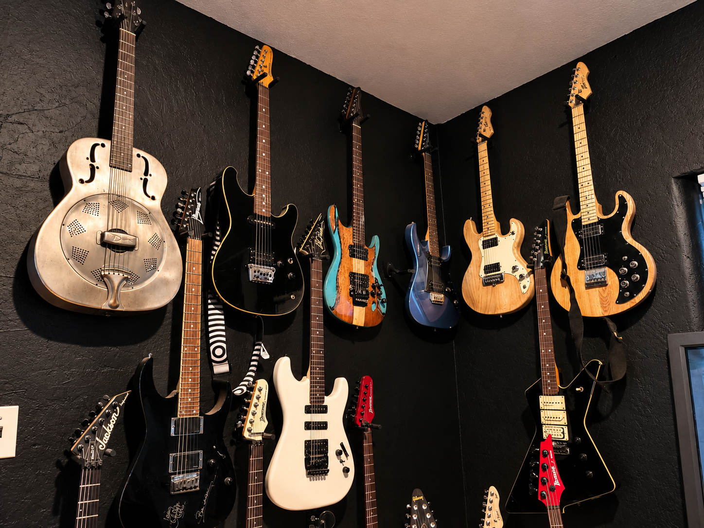 Guitar-Wall-Display-in-Warm-Studio-Light